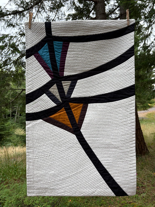 Abstract contemporary quilt titled “How I Bend #9” by artist Marni McMahan, featuring bold stitched arcs and geometric color blocks.