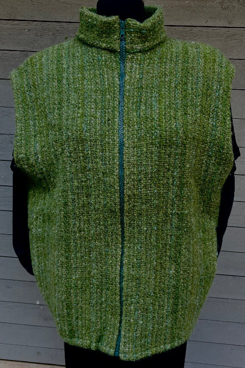 Moss green handwoven wool vest by Vyvyan Dorsett, high collar, zip front, lined with pockets, 44×28 in